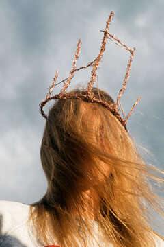 Close-up of unrecognizable woman in handmade wire crown