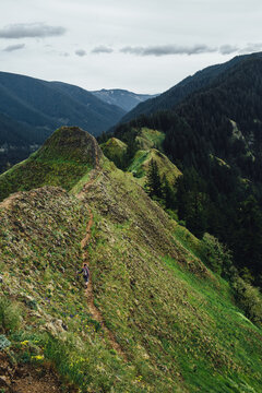 Trail Winding Up Narrow Ridge Mountain Top