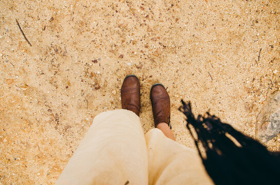 Brown boots with yellow dress