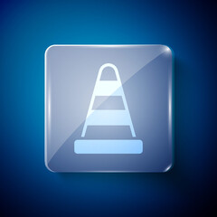 White Traffic cone icon isolated on blue background. Square glass panels. Vector.