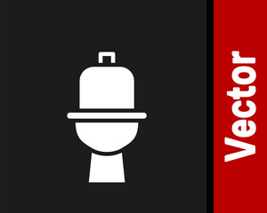 White Toilet bowl icon isolated on black background. Vector.