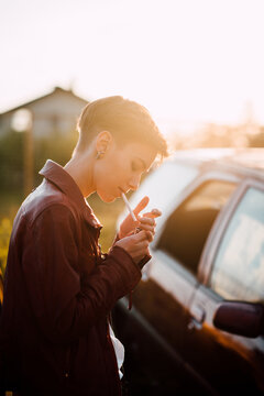 Young attractive woman smoking a cigarette