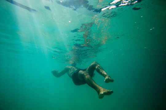 Underwater floating man