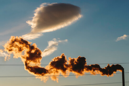 Factory Exhaust from Smokestack in Sky