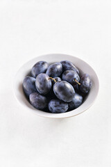 Plums in bowl