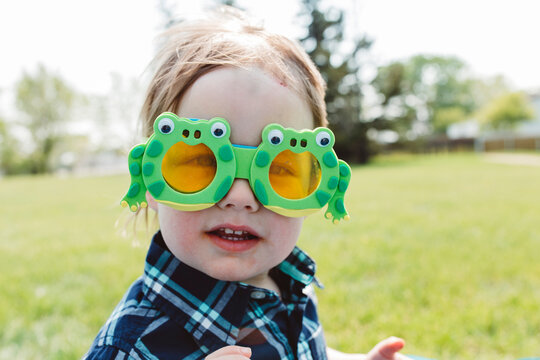Cute boy wearing funny glasses