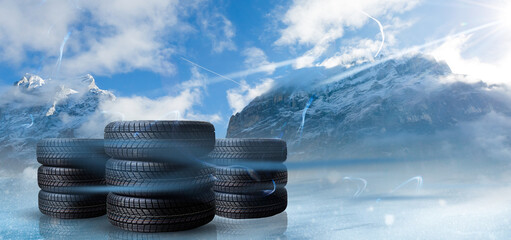 four black tires Winter tire in snowfall