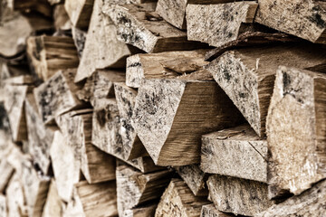 wall of crushed logs dark beige pattern fuel for home heating rustic background
