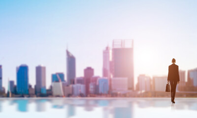 Businesswoman facing new day