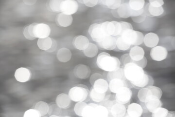 Light reflections on the sea. blurred background