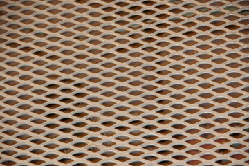 Metal brown grating close-up. Backgrounds.