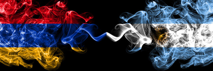 Armenia vs Argentina, Argentinian smoky mystic flags placed side by side. Thick colored silky abstract smoke flags