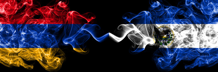 Armenia vs El Salvador, Salvadorian smoky mystic flags placed side by side. Thick colored silky abstract smoke flags