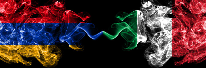 Armenia vs Italy, Italian smoky mystic flags placed side by side. Thick colored silky abstract smoke flags
