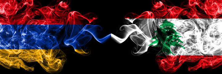 Armenia vs Lebanon, Lebanese smoky mystic flags placed side by side. Thick colored silky abstract smoke flags