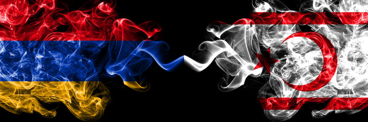 Armenia vs Northern Cyprus smoky mystic flags placed side by side. Thick colored silky abstract smoke flags