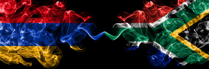 Armenia vs South Africa, African smoky mystic flags placed side by side. Thick colored silky abstract smoke flags