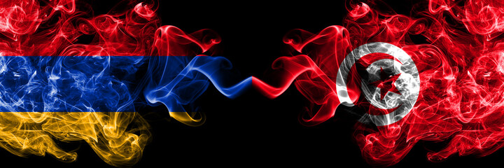 Armenia vs Tunisia, Tunisian smoky mystic flags placed side by side. Thick colored silky abstract smoke flags