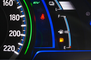 Low gas fuel show on speedometer car dashboard gasoline petrol meter sign. Odometer Day
