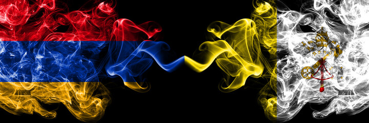 Armenia vs Vatican city smoky mystic flags placed side by side. Thick colored silky abstract smoke flags