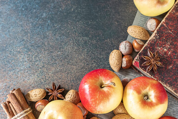 Autumn pastries. Preparation of seasonal fall baked goods with ingredients. Traditional autumn apple pie, spices, apples, accessories.