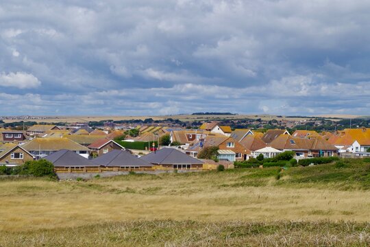 Views of the countryside, summer and a white cloudy skies over Peacehaven and Southdowns National Park, England