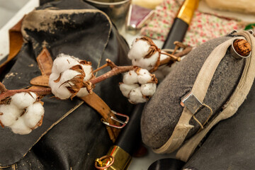 ammunition of a warrior during the civil war of 1861-1865, leather bag bandoleer, flask and sword closeup