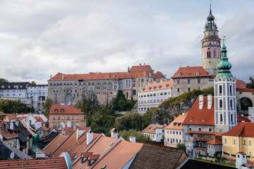 Obraz premium Nice view of the historic center with castle tower and former St. Jodock's Church (St. Jošt Church), Cesky Krumlov, South Bohemia, Czech Republic