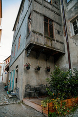 Fototapeta na wymiar Old historic grey building in Cesky Krumlov, South Bohemia, Czech Republic