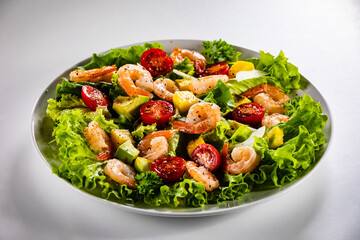 Prawn salad on gray background