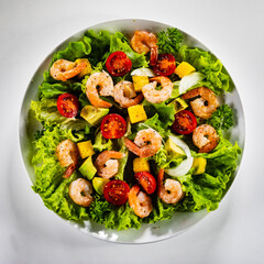 Prawn salad on gray background