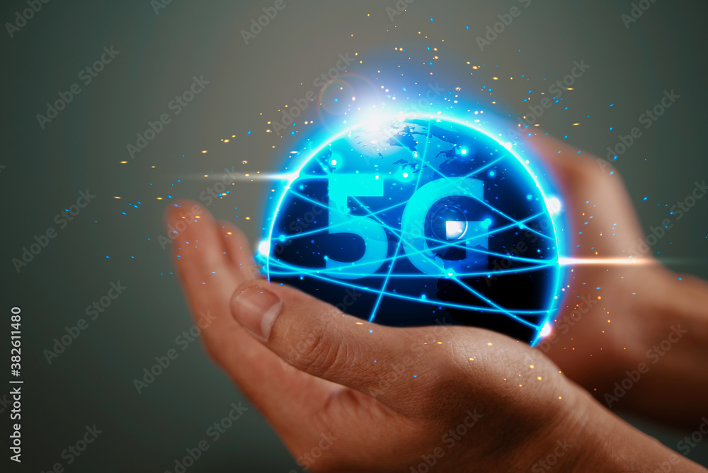 Aufkleber the abstract image of business man hold the 5g hologram and internet of things on hand