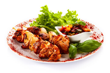 Grilled shashlik with vegetables on white background
