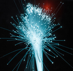 Fiber optics network cable on technology background