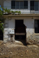Fototapeta na wymiar Old destroyed door in a small village