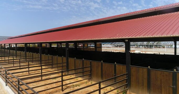 Aerial view above big house ranch or horse farm outdoor at the country. Huge barn view for farm animals outback. western drone real estate concept