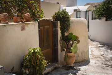 Wooden gate of traditional, medieval village house in Emborio, Santorini, Greece