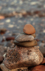 stack of sea stones on the background of the sea