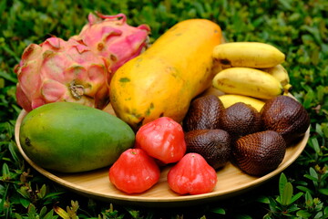 Indonesia Batam - Indonesian tropical fruits Papaya - Plum - Mango - Salak (Snake fruit) - Banana - Pitaya (Dragon fruit)