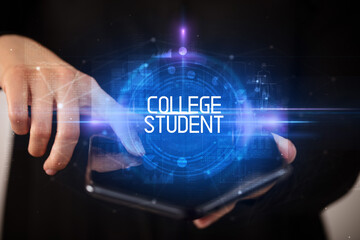 Young man holding a foldable smartphone with COLLEGE STUDENT inscription, educational concept