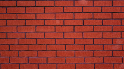 The texture of the brick wall is brown
