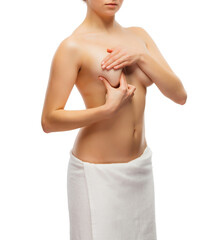Fototapeta premium Woman examining breast isolated on white background 
