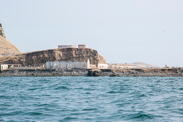 Jail destroyed by bombing on Fronton Island. Prison for terrorists and political prisoners during the dictatorship in Peru. Former prison on an island in the Pacific Ocean.