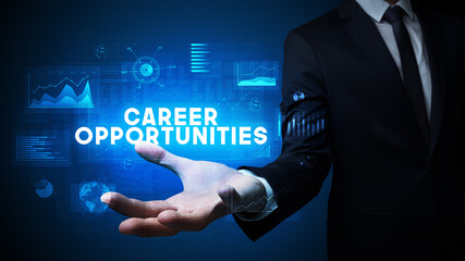 Hand of Businessman holding CAREER OPPORTUNITIES inscription, business success concept