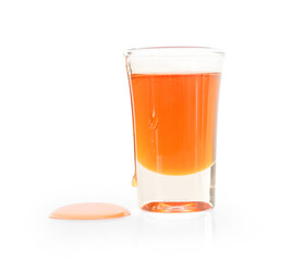 glass of honey isolated on white.
