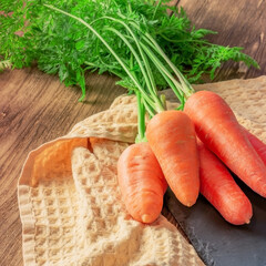 Fresh root vegetable, vegetarian food source of vitamins and keratin harvest orange carrots clean...