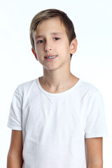 White T-shirt on a cute boy, isolated on white background