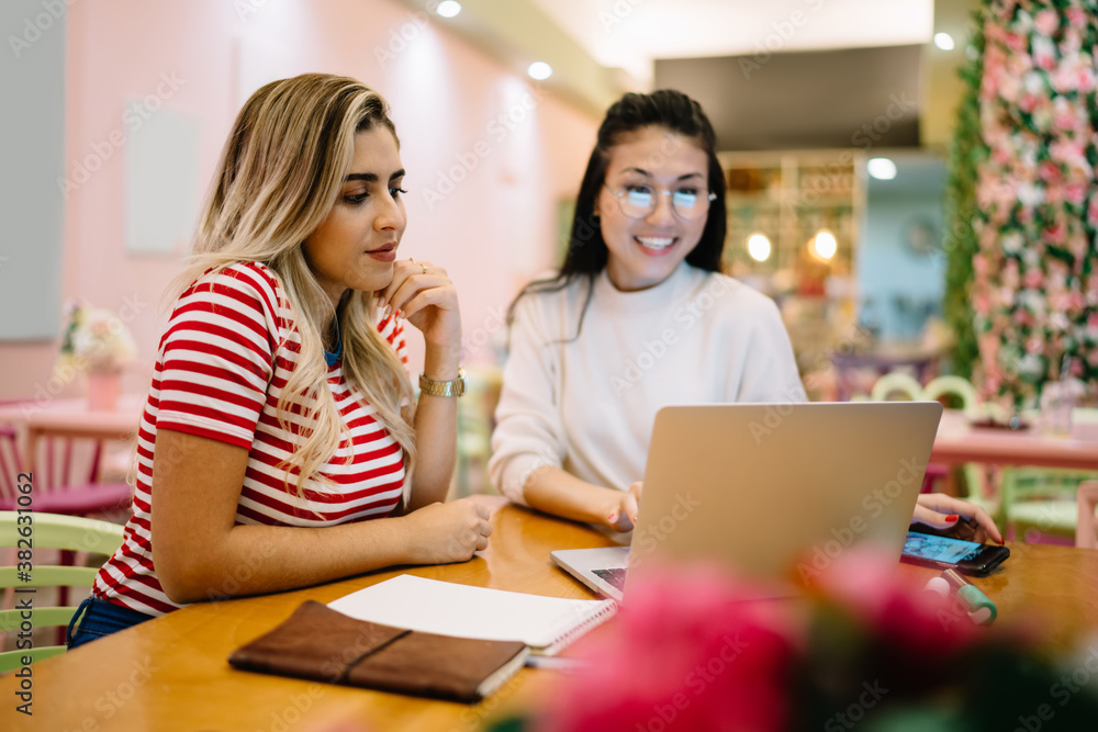 Aufkleber diverse freelancers watching education webinar during online courses using cafe wifi connection for 
