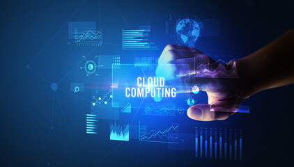 Hand touching CLOUD COMPUTING inscription, new business technology concept
