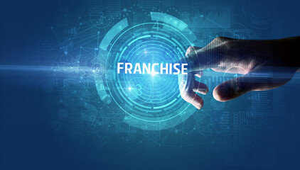 Hand touching FRANCHISE button, modern business technology concept